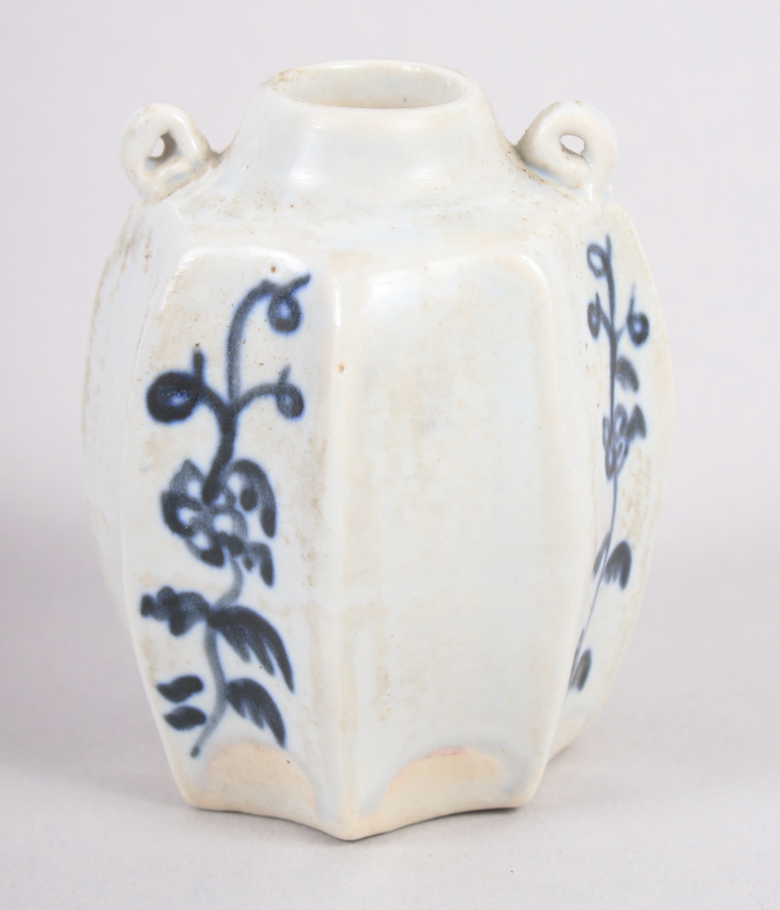 A Yuan Dynasty? miniature twin-handled vase, decorated floral sprigs in underglaze blue, 3" high