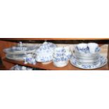 A quantity of Meissen "Onion" pattern china, including platters, tureens, jugs, plates and similar
