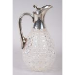 A silver mounted hobnail cut class claret jug, 91/2" high