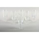 A set of six glasses engraved with the months of the year, signed John Ward RA, 6" high