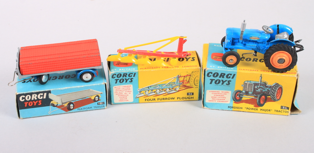 A Corgi Toys die-cast model Fordson "Power Major" tractor, No 55, a Platform trailer, No 101, and