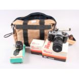 An Asahi Pentax K1000 manual SLR Camera and accessories, in carry case