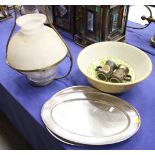 A brass and glass ceiling oil lamp with a frosted glass shade, two Denby coffee cups, two silver