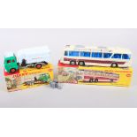 A Dinky Supertoys die-cast model "Refuse Wagon", No 978, and a Vega major luxury coach, No 952, in