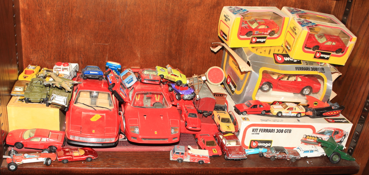 Seven Burego die-cast models of a Ferrari, a Dinky Toys armoured car scout car, a Corgi Land Rover