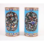 A pair of 19th century Chinese cloisonne enamelled cylinder vases with phoenix and butterfly
