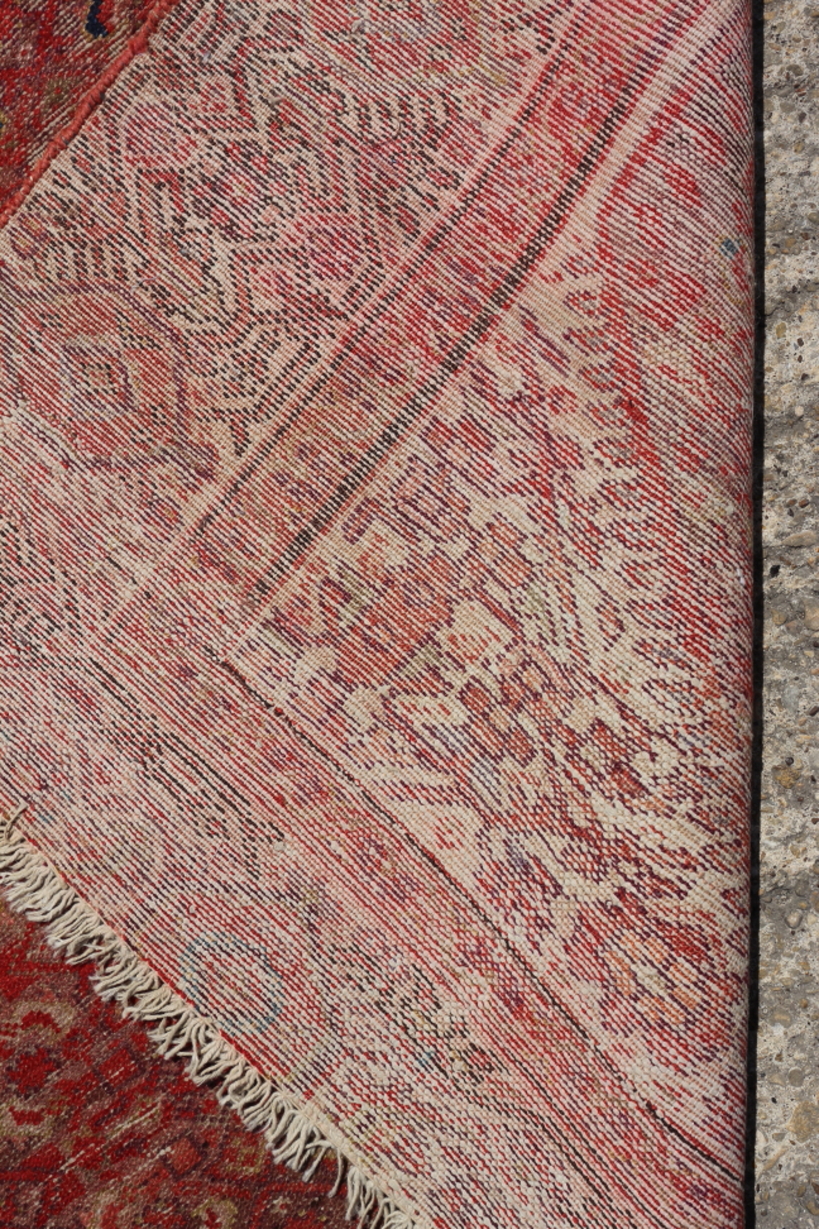 A Turkoman type rug, with all-over geometric design in shades of red, 68" x 50" approx (worn) - Image 3 of 3