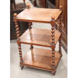 A late 19th century oak three-tier whatnot, on barley twist turned supports, 20" wide x 33" high x