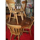 A set of six splat back kitchen chairs with panel seats