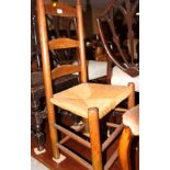 A 19th century ash side chair, with rush envelope seat, on turned and stretchered supports