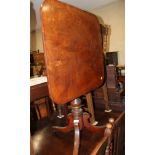 An early 19th century mahogany rectangular tilt top octagonal table, on tripod splay support, top