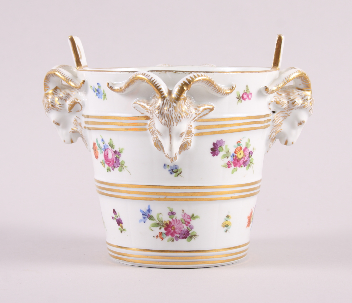 A Dresden porcelain cache pot with ram's head handles and floral decoration, 5 1/2" high