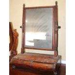 A 19th century swing frame toilet mirror, on plateau base, fitted shape front drawers, on turned