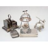 Two silver plated breakfast warmers, a plated service bell, a plated sandwich box and a plated hip