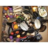 A quantity of beaded necklaces, brooches and other mixed jewellery