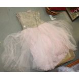 A 1950s Christian Dior pink satin evening coat, a 1950/60s Christian Dior pink net dress with beaded