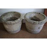 A pair of cast stone garden planters with Tudor rose decoration, 17" dia x 13" high