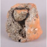 A piece of orange (or faded red) coral, 192.9g, 2" high