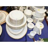 A Japanese Wyndham white and gilt bordered part dinner service