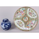 A Canton plate, decorated panels with figures, birds, insects and flowers, 9 3/4" dia, and a blue