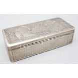 A white metal rectangular snuffbox with engine turned, engraved decoration and gilt interior,
