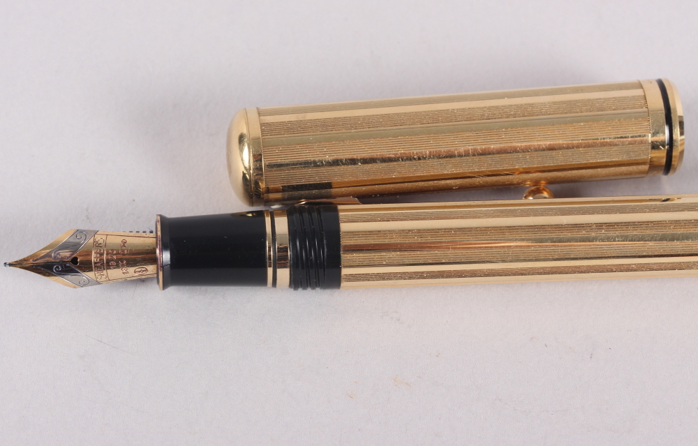 A Shaeffer gold plated fountain pen, a gold plated Cartier ball point pen and a similar felt tip - Image 7 of 9