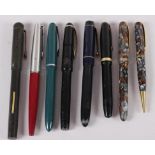 Seven fountain pens, various, and a propelling pencil
