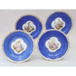 Four 19th century Meissen figure decorated plates on a blue ground, 9" dia (seconds)