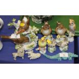 A Herend model of an owl, a Meissen group of robins, and other model animals