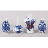 A pair of Chinese blue and white miniature vases, decorated foliage, 3 1/2" high, a sprinkler vase