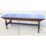 A largely 19th century oak and walnut plank top refectory style dining table, on turned and