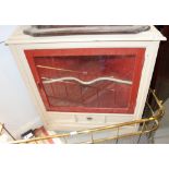 A cream and red painted corner unit with raised back enclosed shelf below drawer, 36" wide