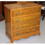 A yew and banded chest of four long drawers with canted corners, 31" wide x 31 1/2" high x 16 1/2"