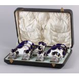 Six Coalport blue and gilt decorated coffee cups with silver holders and six saucers, 4.5 oz troy