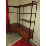 A 1960s Avalon ladder high-rise corner unit, fitted shelves over cupboard and a record cabinet