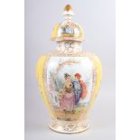 A 19th century Vienna oviform jar and cover with figure decoration and floral panels, on a yellow