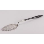 A Continental white metal serving slice with pierced and raised Neo-Classical decoration and