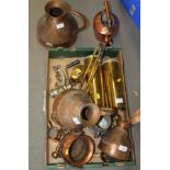 A copper teapot, three copper jugs, two brass trench art shells, a copper cauldron and other items