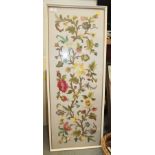 A crewel work panel of 17th century floral scrollwork design on a silken ground, 37" x 13 1/2", in