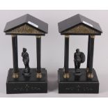 A pair of 19th century slate porticos with figures, a Roman general and a Gaul, 11" high