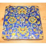 A Persian 18th century floral patterned tile, 10" square