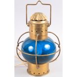 A ship's brass and blue glass lamp, 10 1/2 high