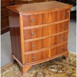 A yew and banded bowfront chest of four long drawers, on bracket feet, 34" wide x 36" high x 20"