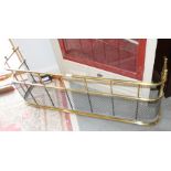 A 19th century brass and wirework fender and spark guard, 48" wide x 18" high