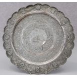 An Indian white metal tray with floral decoration and regimental insignia to border, 27.2oz troy