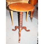 A late 19th century mahogany circular tilt top occasional table, on bobbin turned column and