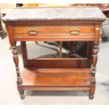 An Edwardian mahogany and marble top hall stand, fitted one drawer with undertier, on turned