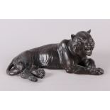 A Japanese spelter model of a tiger with seal mark to base
