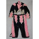 An antique velvet matador costume with bead embellishment