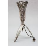 A 19th century white metal mussie tussie / posy holder with pierced, embossed and engraved